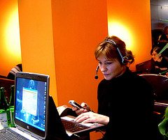 effective web meeting - photo of woman with headset on at computer